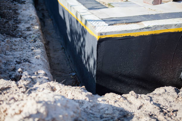 Professional Waterproofing technician working in Lakewood, IL